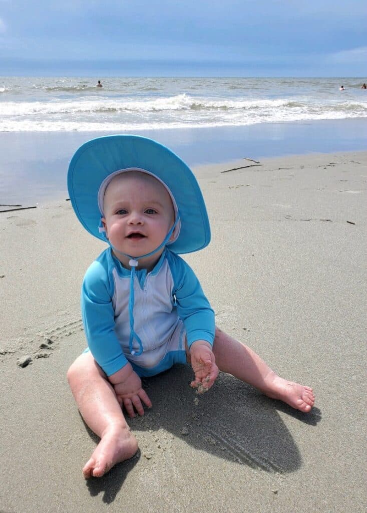 Jacob in the sand on his first beach trip