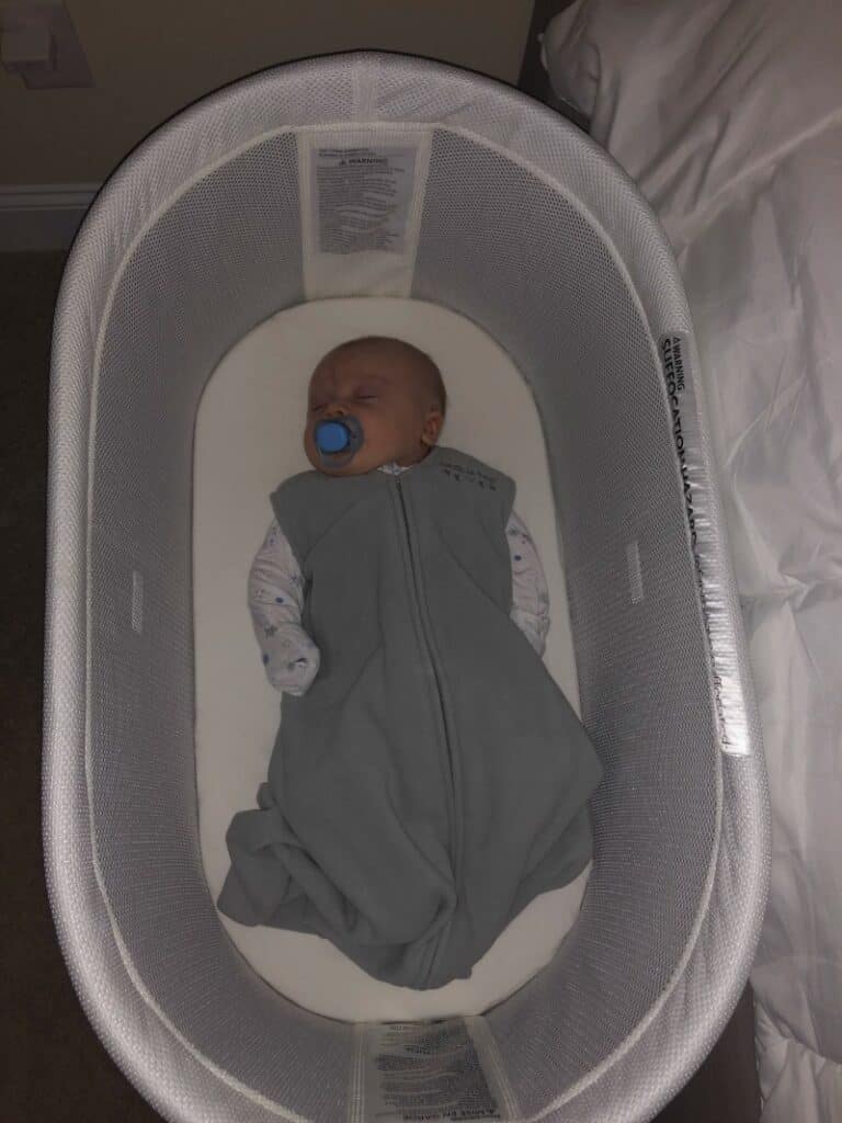 Jacob sleeping in his bassinet