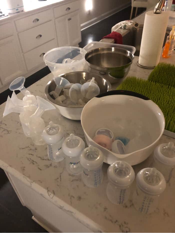 Bottles and pump parts on the kitchen counter