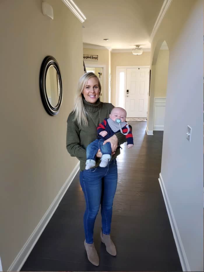 Lindsey holding Jacob at home at 4 months old