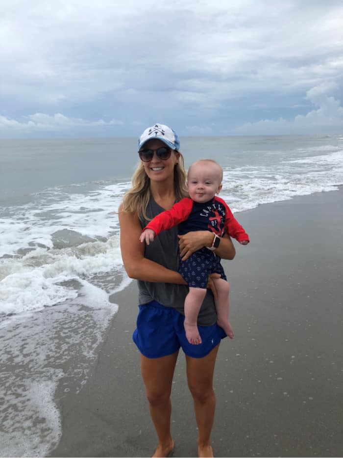 Lindsey holding Jacob at the beach