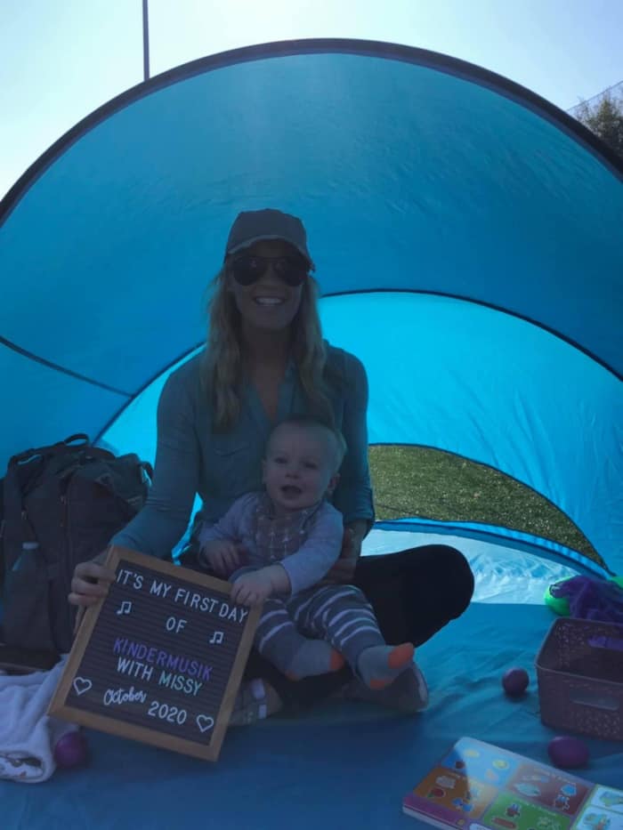 Jacob and Lindsey in their blue tent on their first day of Kindermusik class outdoors. 