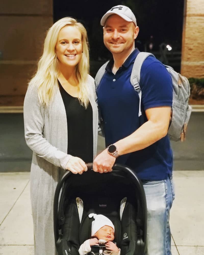 Joey, Lindsey and Jacob about to leave the hospital. Jacob is buckled up in his carseat.