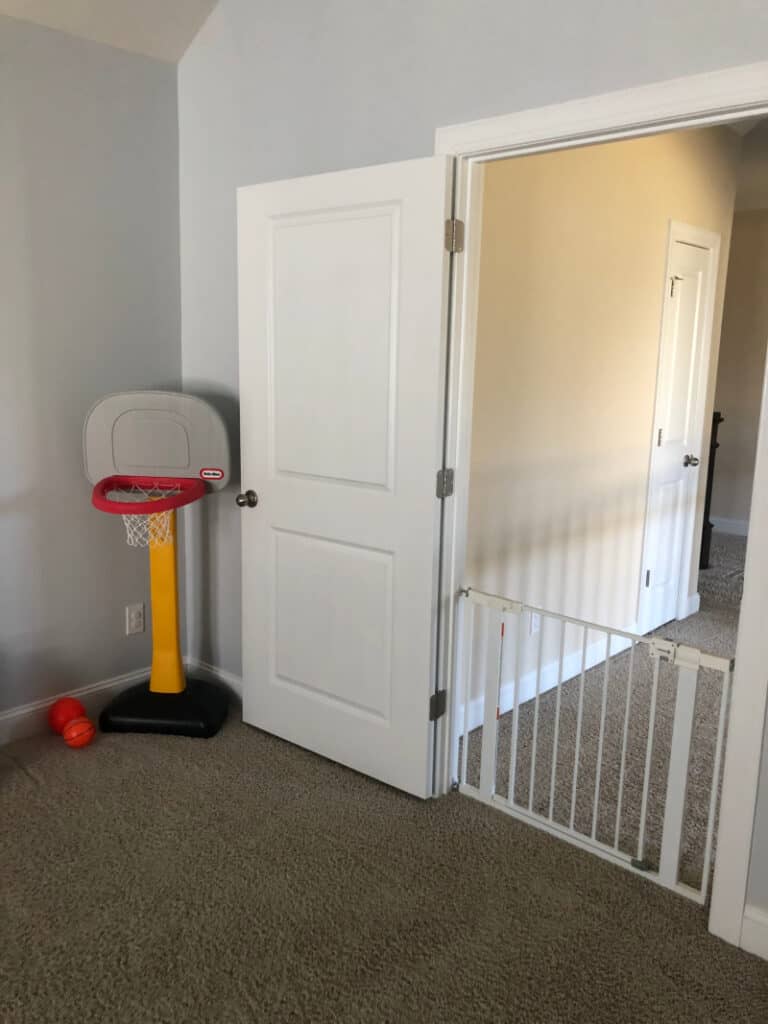 The kid basketball goal and baby gate.