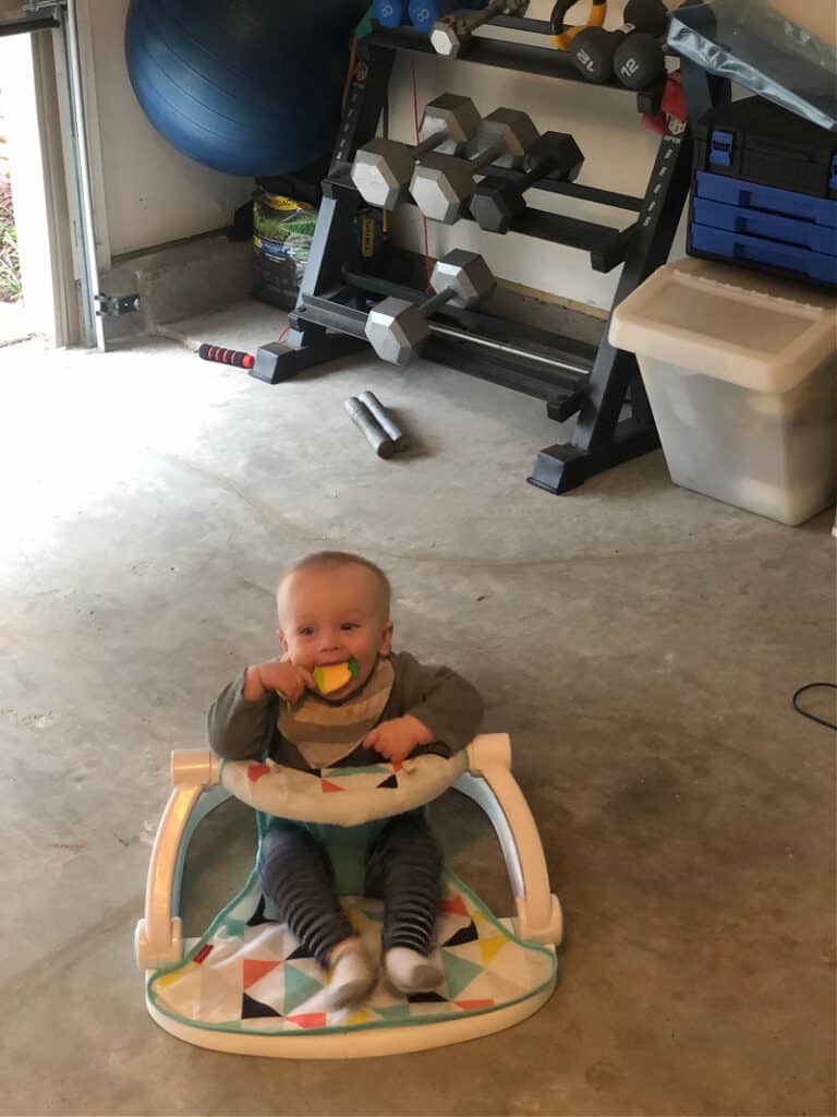 Jacob in his sit me up chair in the garage