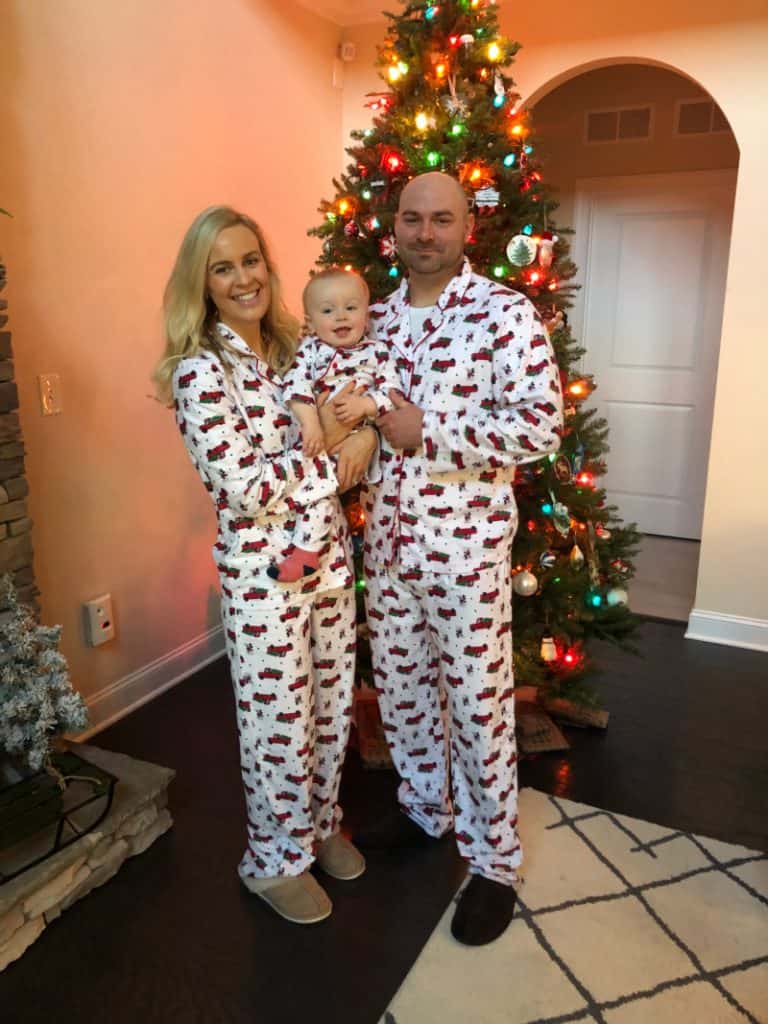 Family pajama pic standing by the tree