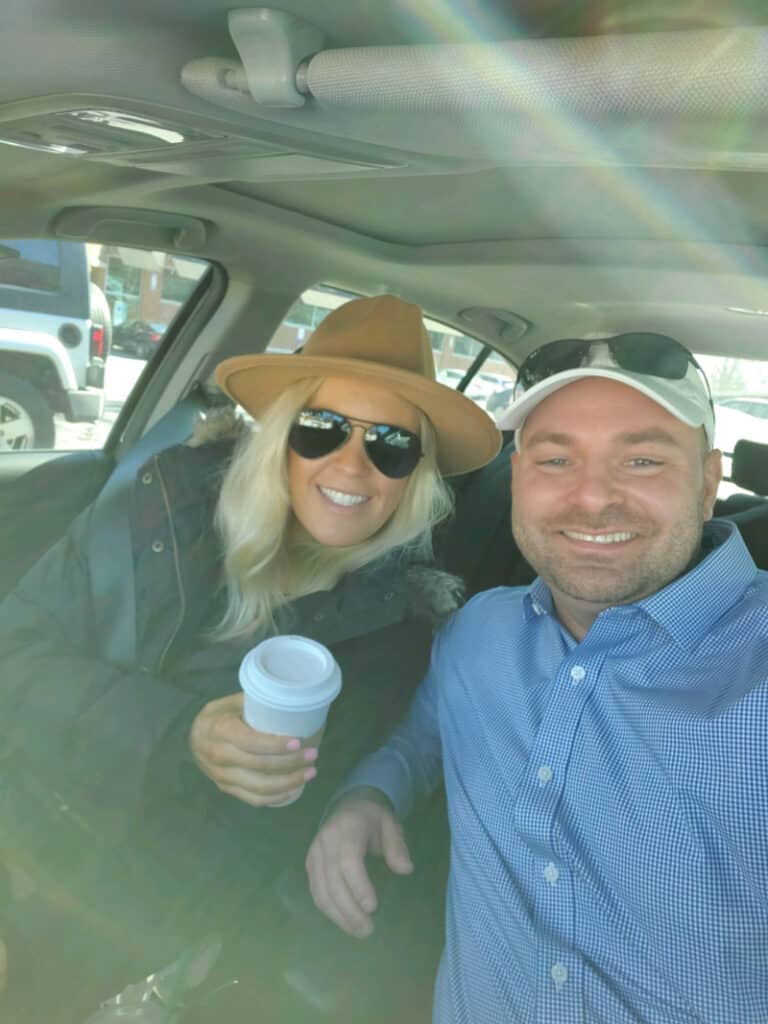 Lindsey and Joey in the car with coffee